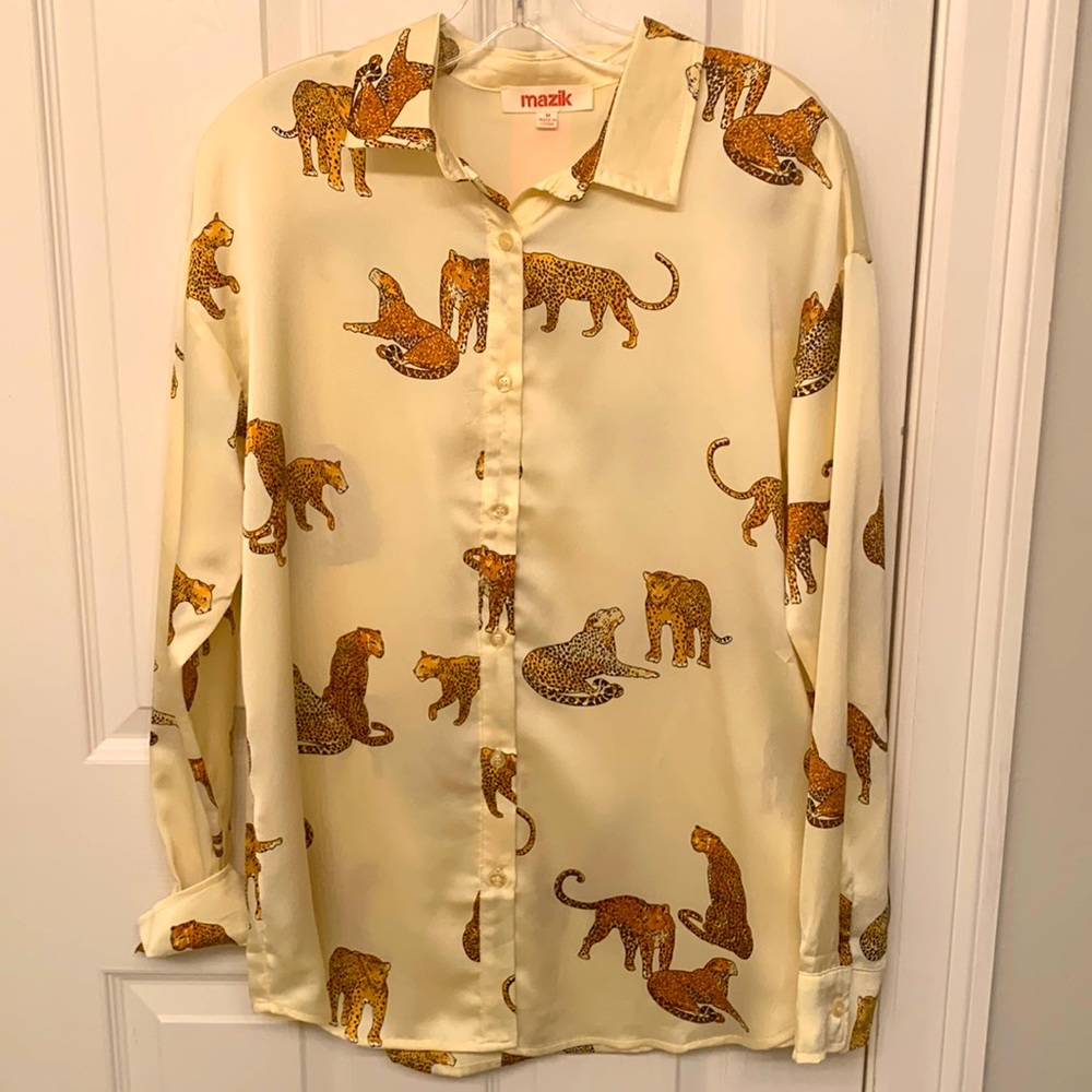 Blouse NEW cheetah print. Never worn.
